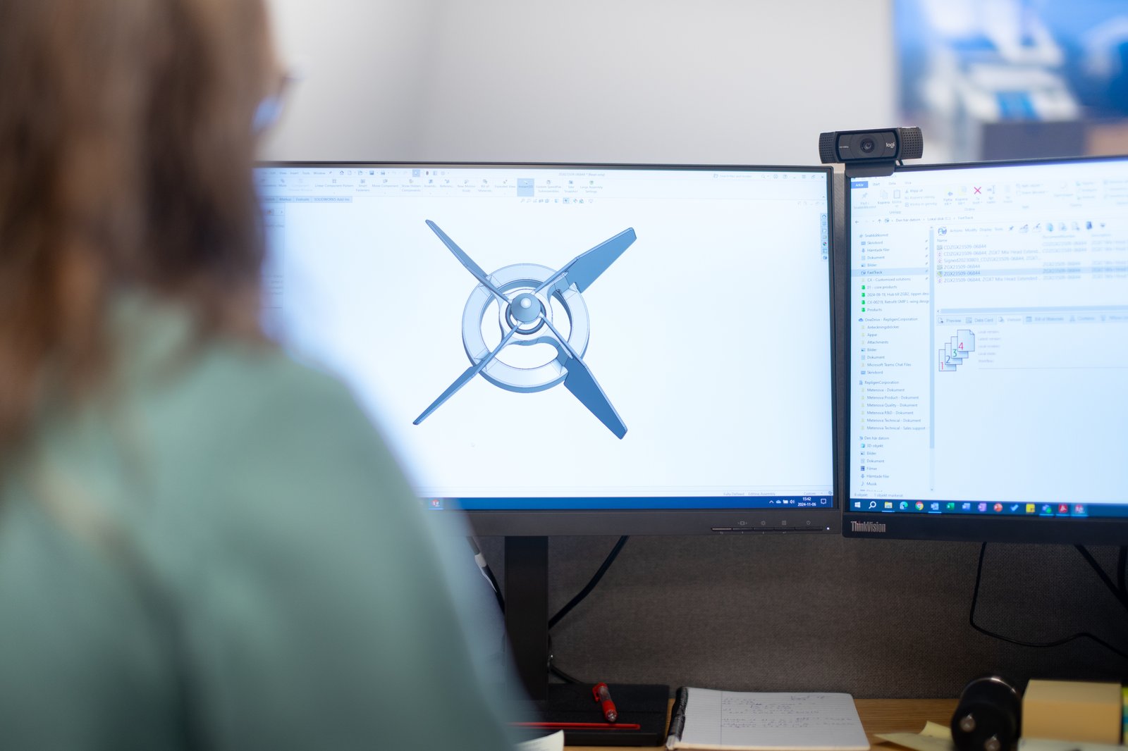 Metenova employee sketches on the computer